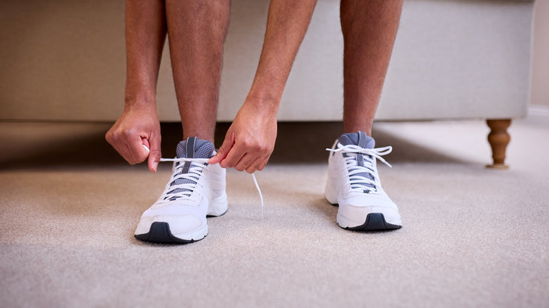 man wearing sneakers